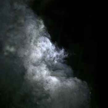 Abstract smoke on a black background. Very soft shapes.