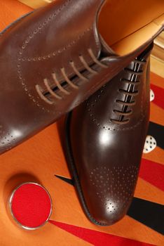 Man's fashion shoe on the backgammon board