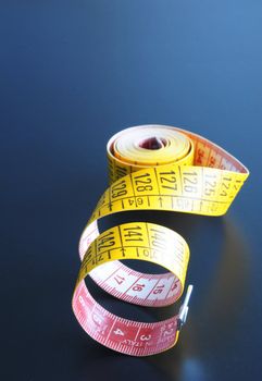 measuring tape showing diet or taylor concept