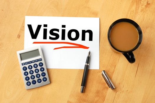 business vision concept with paper pen and coffee in office