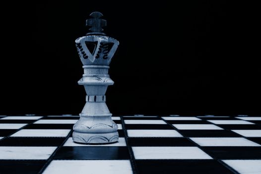chess pieces showing concept of conflict power and success