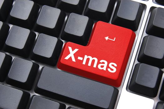 xmas christmas or x mas concept with computer button
