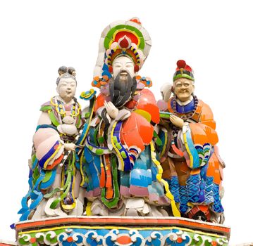 Colorful oriental god group on traditional temple roof in white background.