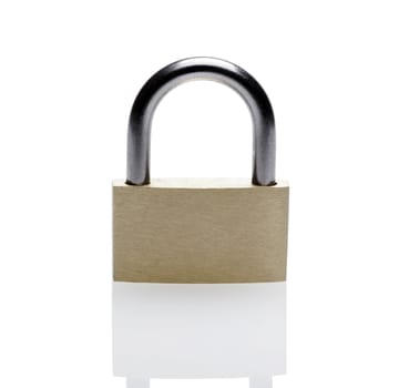 Closed Brass Metal Padlock On A White Background With Reflection