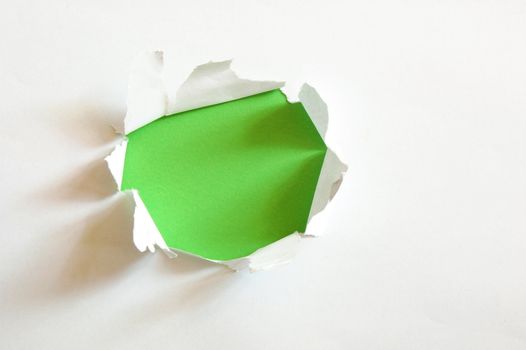 green hole with copyspace in empty sheet paper