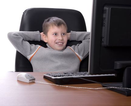 teenager with his feet up on a desk in office over white