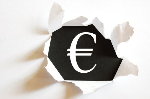 money concept with hole in paper and black background