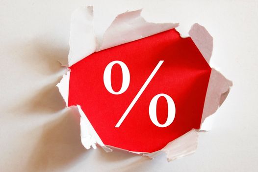 sale concept with hole in blank paper
