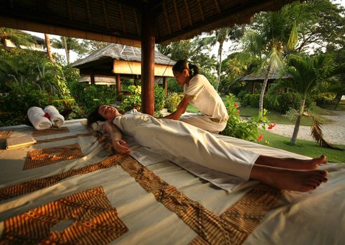 White woman on massage in Bali salon