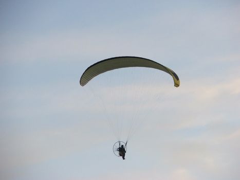 a guy with parachute and some engine