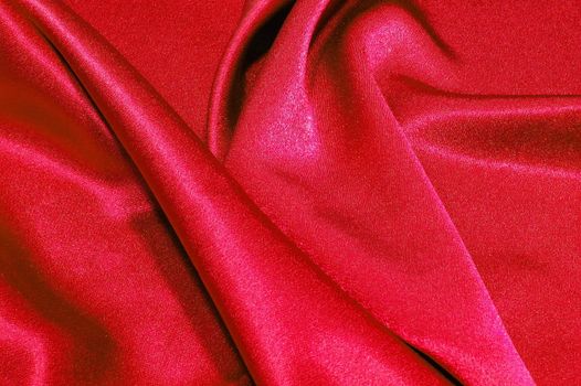 red satin or silk background with textile texture