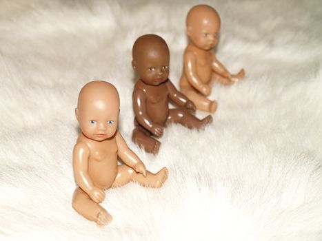 three sitting babydolls