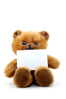 toy teddy bear with blank sheet isolated on white background