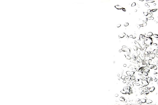 bubbles of air in water on white background