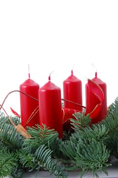 christmas wreath isolated on white background with red candles