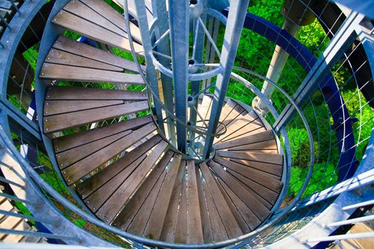spiral white stairs outside on fresh air