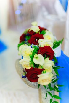 Wedding table set with glasses and small wrapped present