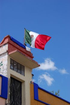 Mexican Flag on Top of Building in Chiapas, Mexico