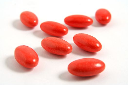 A few medicine tablets on a table