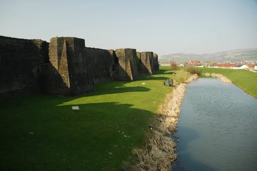 caerphilly castle with water, horizontally framed shot