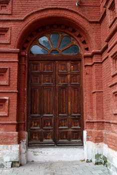 Closed wooden door of Russian church