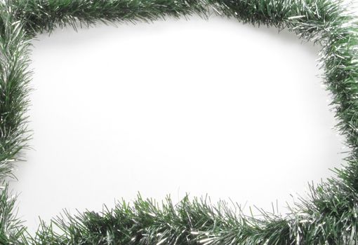 green tinsel border as a festive background