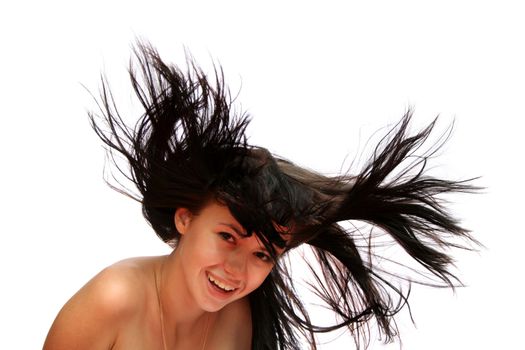 brunette girl with long windy hair, isolated on white