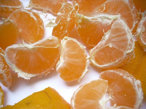 This is a photograph of some fresh and sweet fruits of mandarin and its lobules