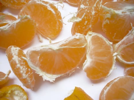 This is a photograph of some fresh and sweet fruits of mandarin and its lobules