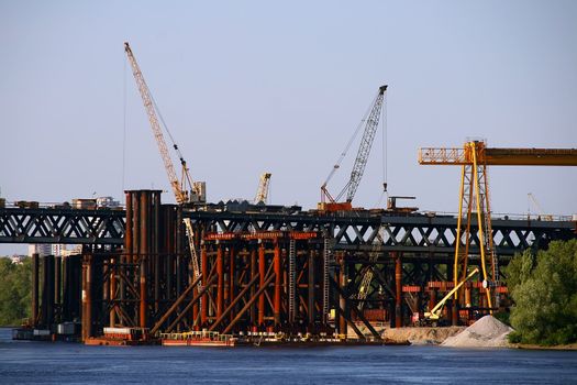 bridge building on Dnieper river, idustrial landscape in Kiev, Ukraine