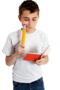 A child with a snall notebook and a large pencil