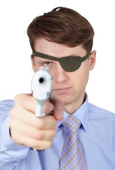 Portrait of a young guy with eye-patch shooting a pistol on white