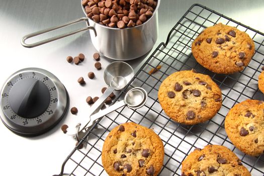 Freshly baked chocolate chip cookies on cooling rack