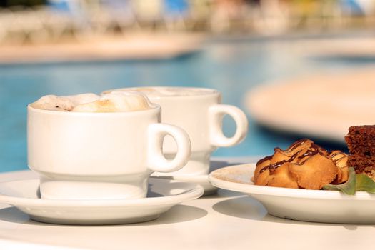 Morning coffee with biscuits and cake