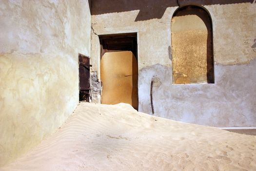 Desert taking over the town of Kolmanskop Namibia