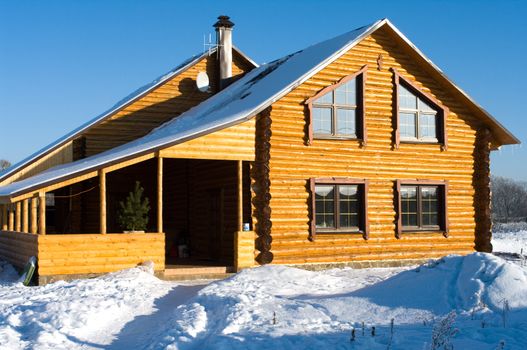 The timbered country house in the winter.