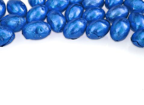 blue easter egg border on white background