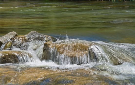 great image of water on rocks in the stream or river