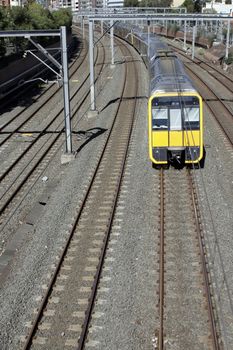 Straight Railway Tracks With Approaching Train, Public Transportation