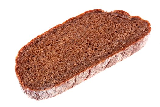 The slice of the black bread which has been cut off from a loaf on a white background.