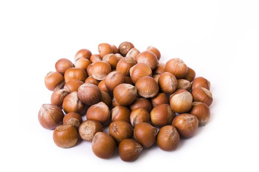 Selection of hazelnuts isolated on white background