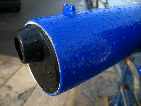 Detail of telescope and raindrops after a rainfall