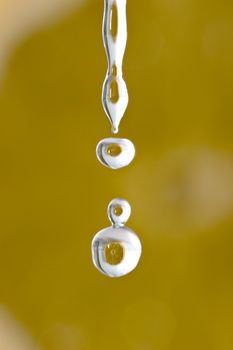 Lemon reflected on water drop