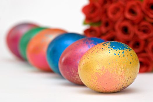 Easter Eggs and Flowers on White