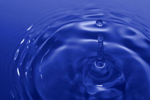 Blue drop and ripples