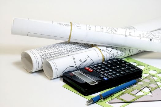 Tools for Engineer - Roll of plans and drawings, calculator,traingle and templates