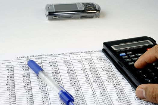 Spreadsheets Reviewed with a hand calculator and pen