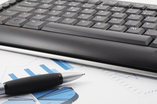 keyboard and paper on a desk in the office