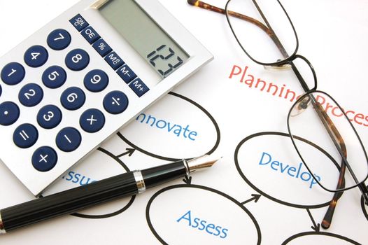 planning a new business with pen and paper