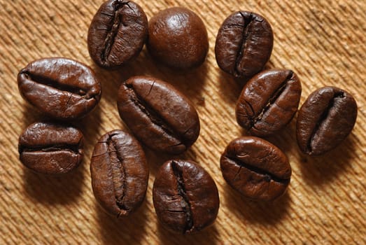 roasted coffee beans.brown color background